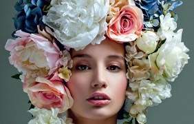 Motif of a woman with flowers as hair, key visual for the Tulln horticultural fair